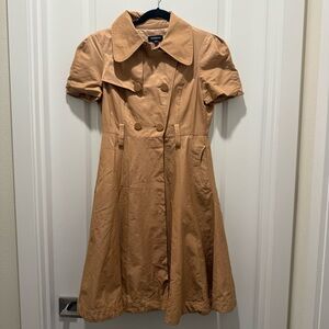 bebe Tan Trench Coat in size small
Belt missing